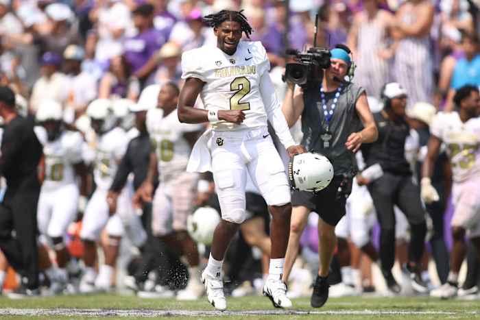 Colorado Buffaloes quarterback Shedeur Sanders (2) celebrates after winning the game against the TCU Horned Frogs at Amon G. Carter Stadium
